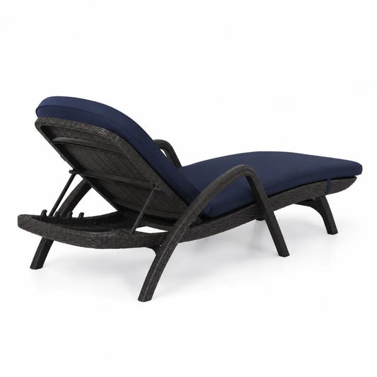 Chaise longue extérieure en résine tressée avec coussin bleu marine